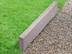 Rasenkante Sandstein Kandla Grey mit Rasen und Kies