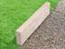 Rasenkante Travertin Medium Select mit Rasen und Kies