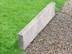 Rasenkante Travertin Silver mit Gras und Kies