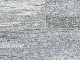 Nahaufnahme von grauen Granitplatten Urban Grey Line