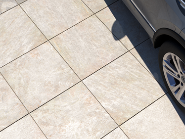 Ansicht von oben auf Steinoptikplatten Classic Beige 3cm mit Anschnitt Auto