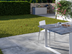 Terrasse mit Betonoptikplatten Ombra 3cm mit Tisch und Outdoorküche