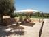 Mediterrane Terrasse mit Travertin Medium