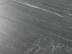 Dunkelgraue Fliesen aus Feinsteinzeug mit weißen Maserungen aus der Nähe fotografiert