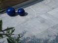Gartendeko auf Kalksteinplatten Blaustein Azur